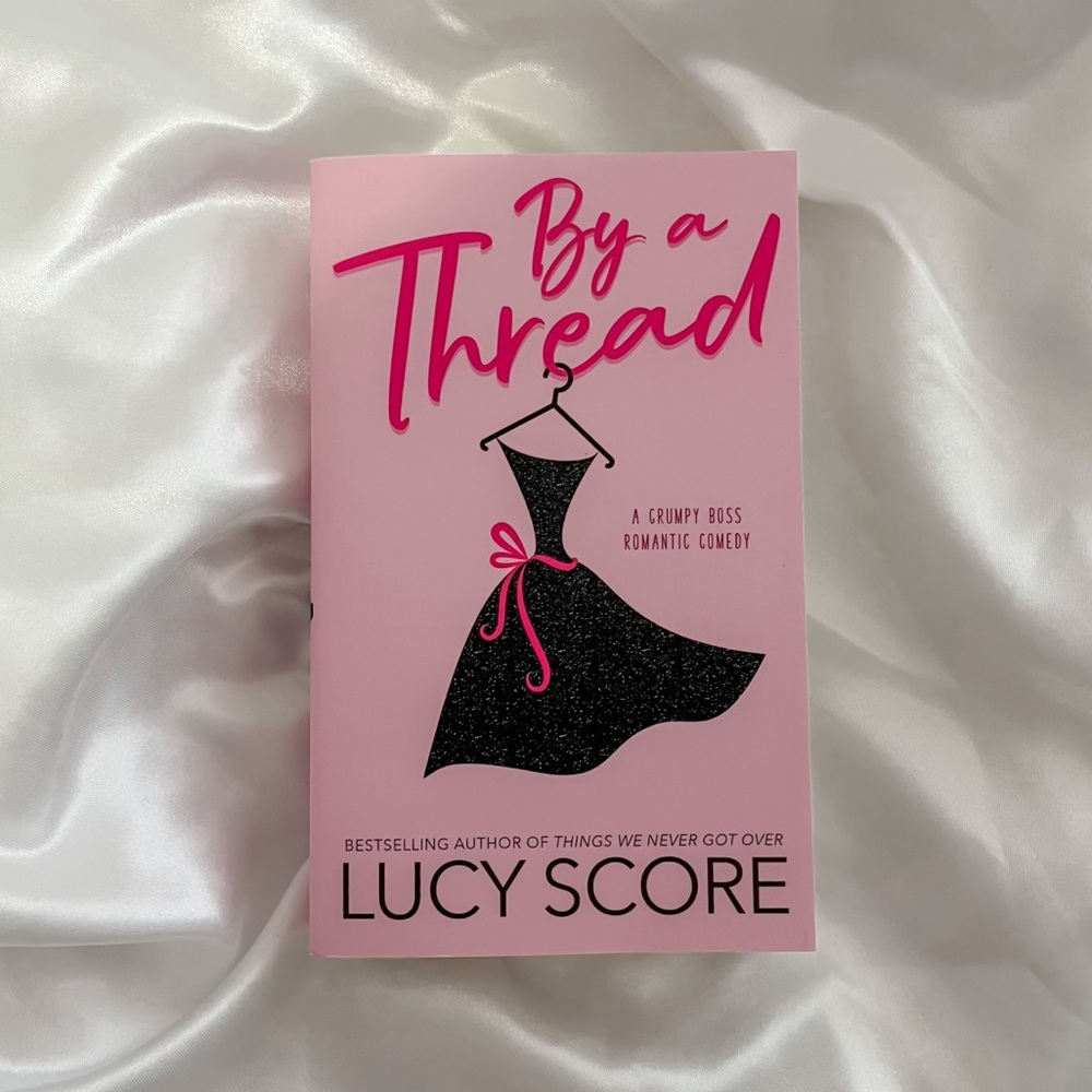 BY A THREAD by LUCY SCORE